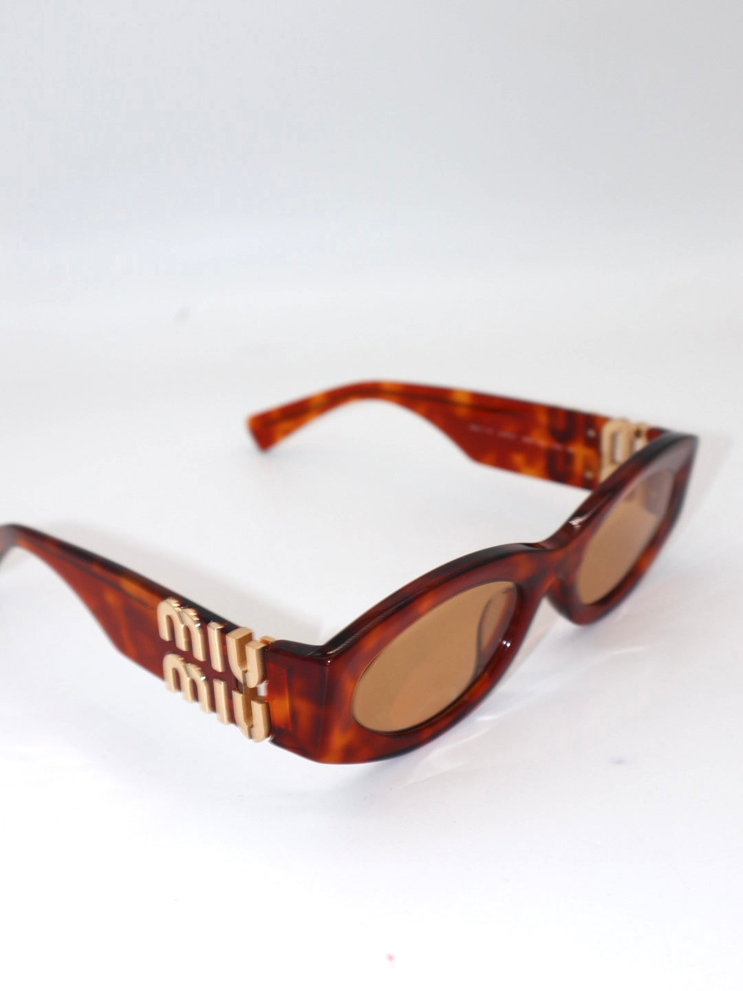 Lentes Miu Miu